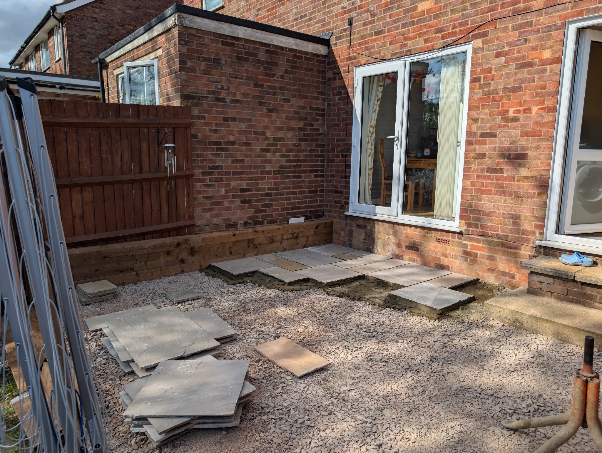 Compacted sub-base covering the new patio area